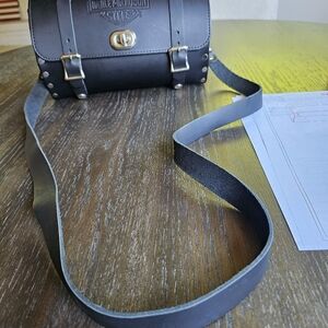 Harley Davidson genuine leather barrel bag.  Great condition.